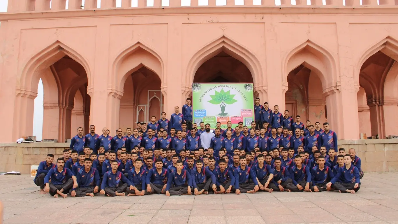 Naveen K. Kolli conducting yoga with Indian Army — group session