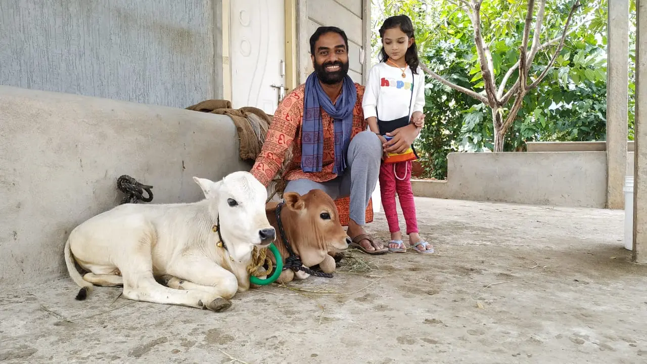 Naveen K. Kolli in Eka Pada Rajakapotasana outdoors
